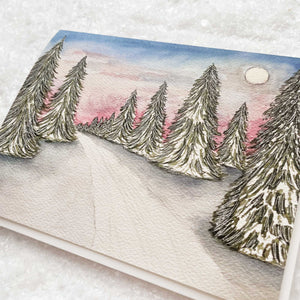 Christmas cards featuring a watercolor of a snow scene.